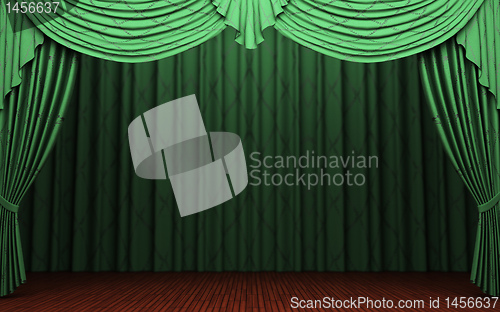Image of green velvet curtain opening scene