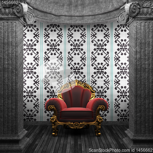 Image of stone columns, chair and tile wall