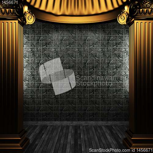 Image of bronze columns and tile wall
