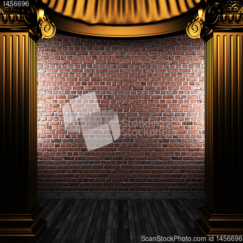 Image of bronze columns and wall