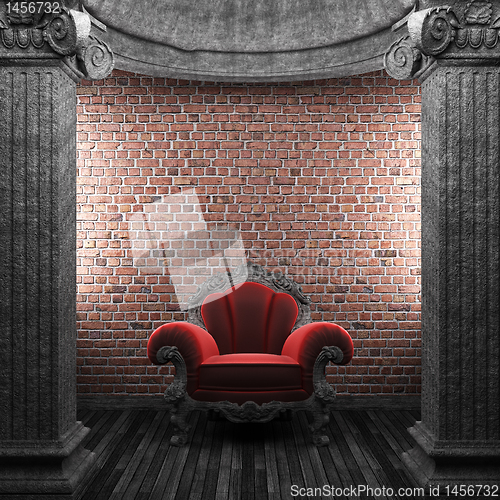 Image of stone columns and chair