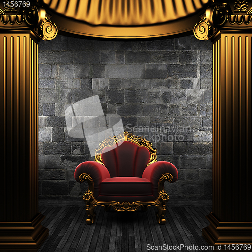 Image of bronze columns and chair