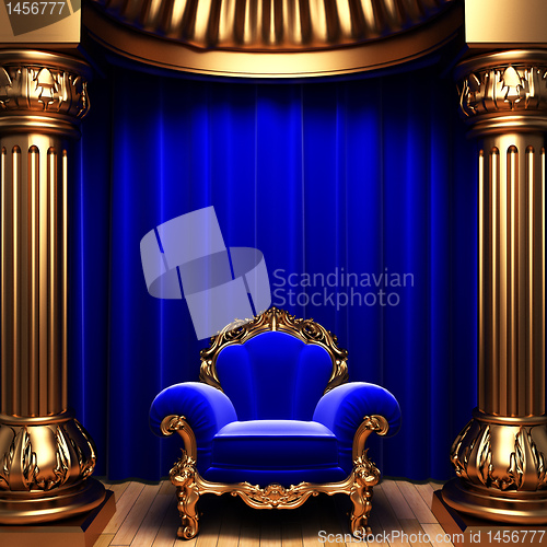 Image of blue velvet curtains, gold columns and chair