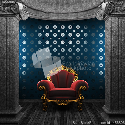 Image of stone columns, chair and tile wall