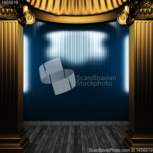 Image of bronze columns and tile wall