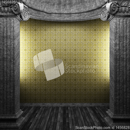 Image of stone columns and tile wall