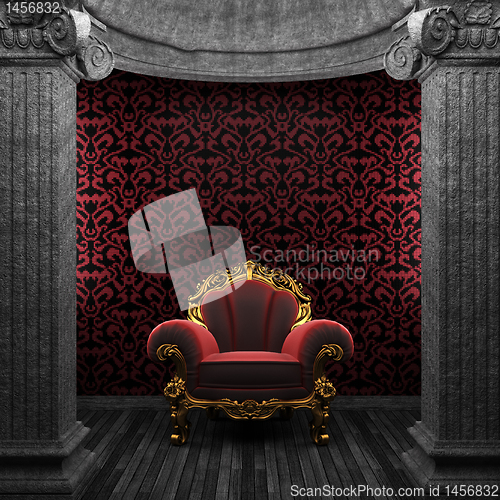 Image of stone columns, chair and tile wall