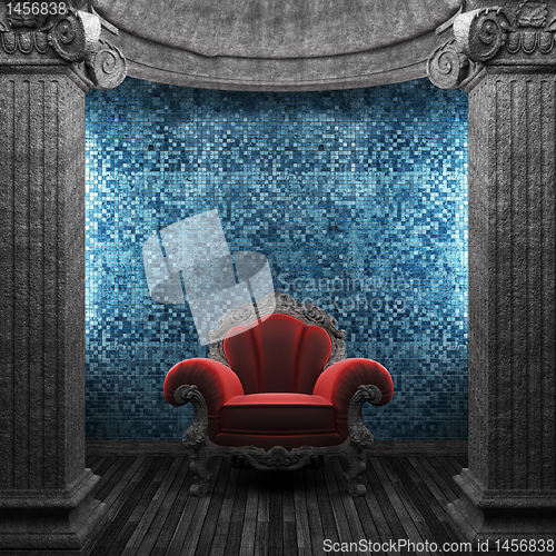 Image of stone columns, chair and tile wall