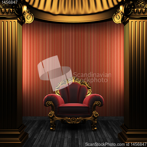 Image of bronze columns, chair and wallpaper