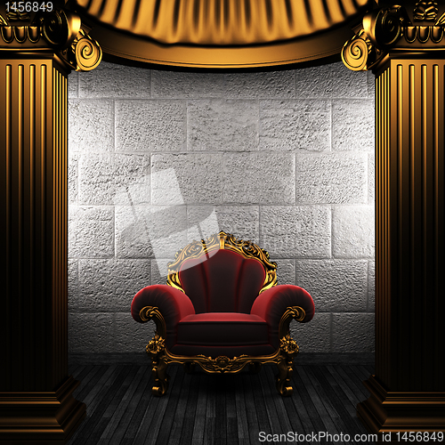 Image of bronze columns and chair