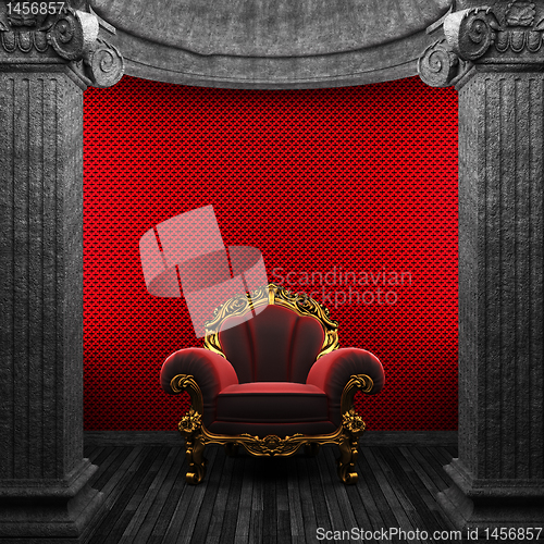 Image of stone columns, chair and wallpaper