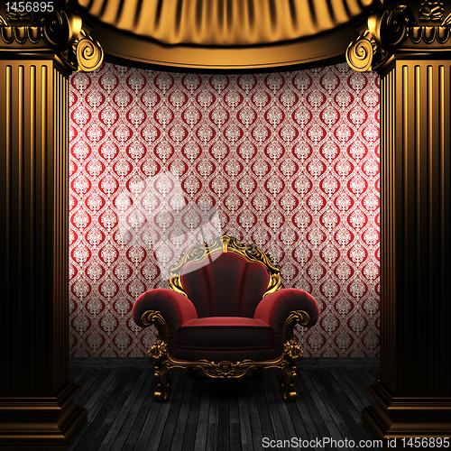 Image of bronze columns, chair and wallpaper