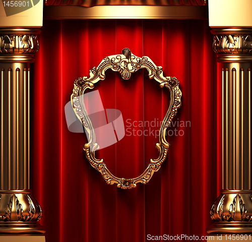 Image of red curtains, gold columns and frames