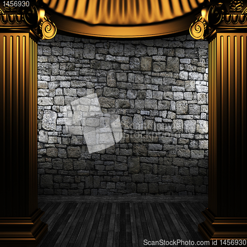 Image of bronze columns and wall