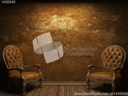 Image of old concrete wall and chair