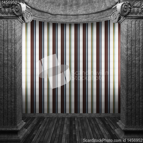 Image of stone columns and tile wall