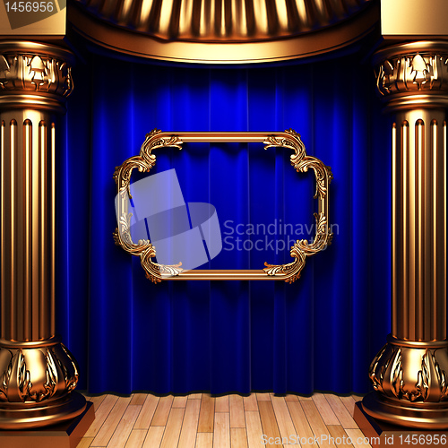 Image of blue curtains, gold columns and frames