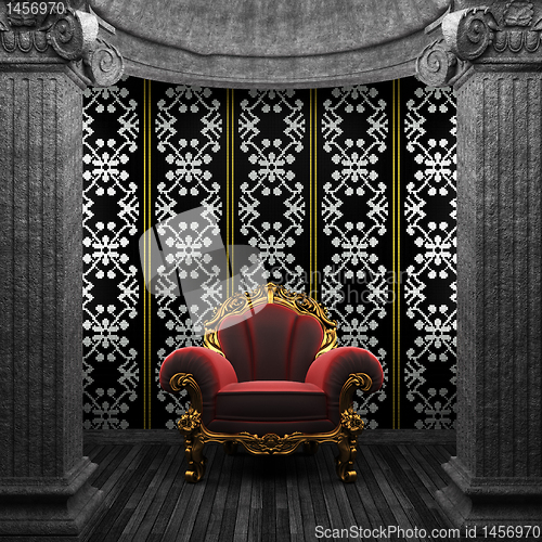 Image of stone columns, chair and tile wall