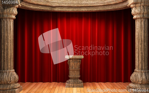 Image of red velvet curtains, wood columns and Pedestal