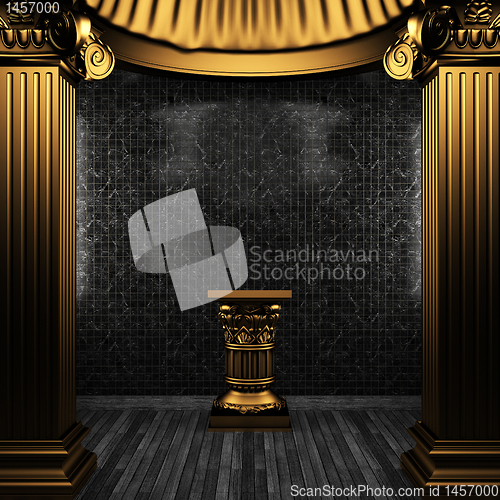 Image of bronze columns, pedestal and tile wall