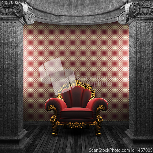 Image of stone columns, chair and wallpaper
