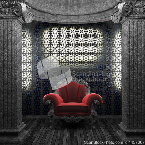 Image of stone columns, chair and tile wall