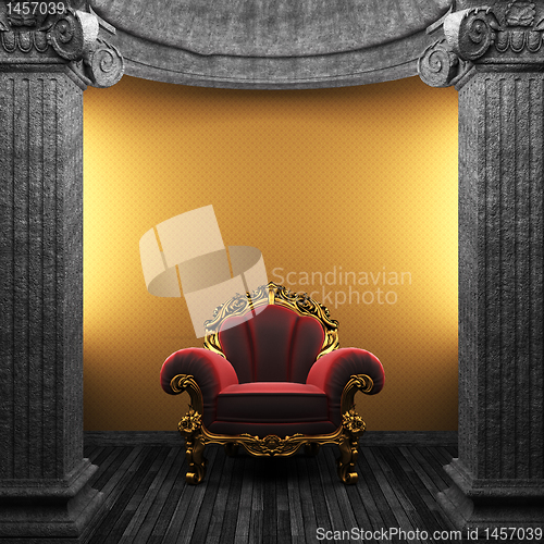 Image of stone columns, chair and wallpaper