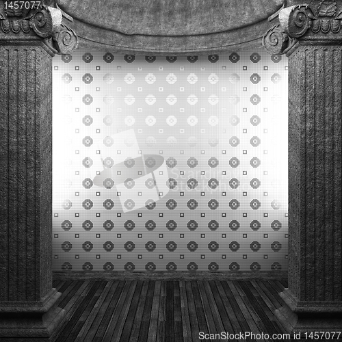 Image of stone columns and tile wall