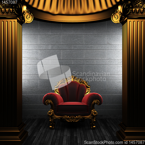 Image of bronze columns and chair