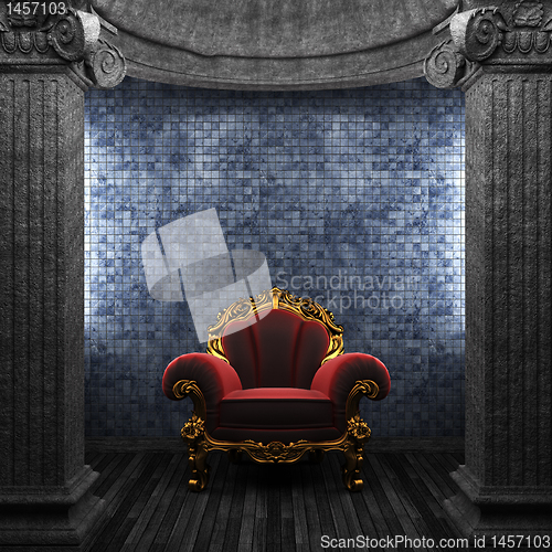 Image of stone columns, chair and tile wall