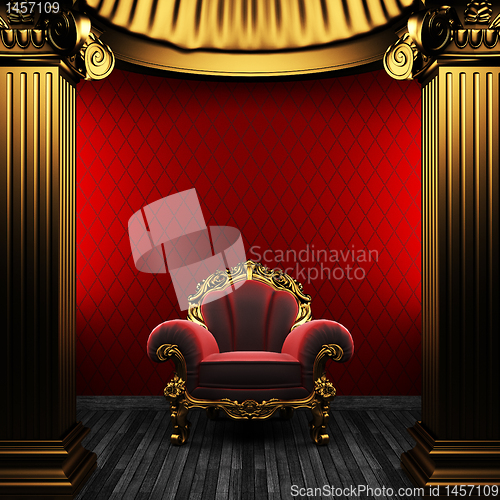 Image of bronze columns, chair and wallpaper