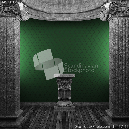 Image of stone columns, pedestal and wallpaper