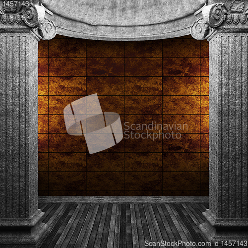Image of stone columns and tile wall