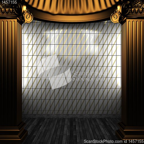 Image of bronze columns and tile wall