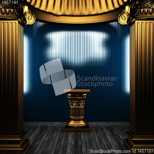 Image of bronze columns, pedestal and tile wall