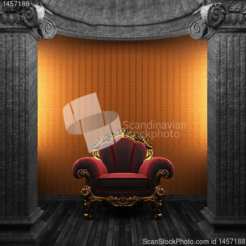Image of stone columns, chair and wallpaper