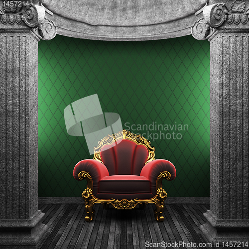 Image of stone columns, chair and wallpaper