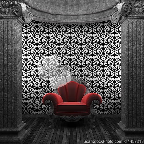 Image of stone columns, chair and tile wall