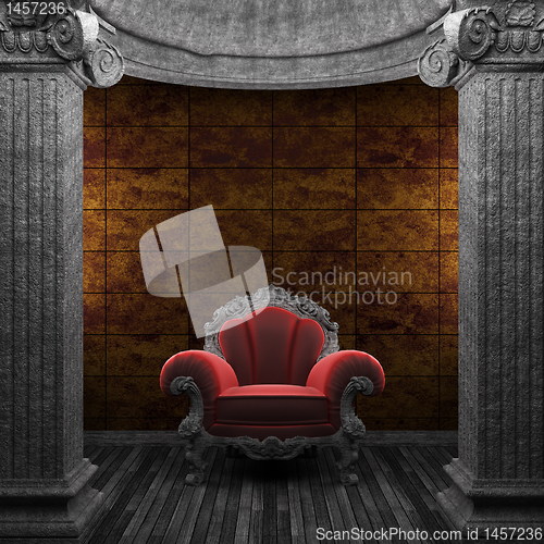 Image of stone columns, chair and tile wall
