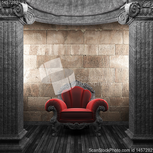 Image of stone columns and chair