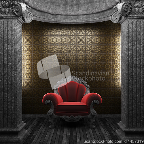 Image of stone columns, chair and tile wall