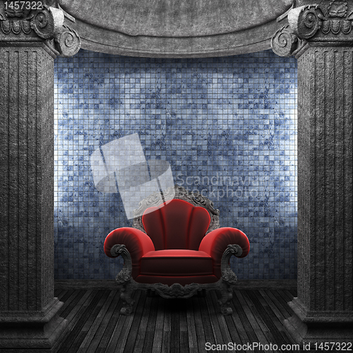 Image of stone columns, chair and tile wall
