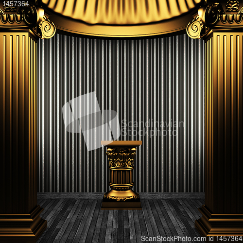 Image of bronze columns, pedestal and wallpaper