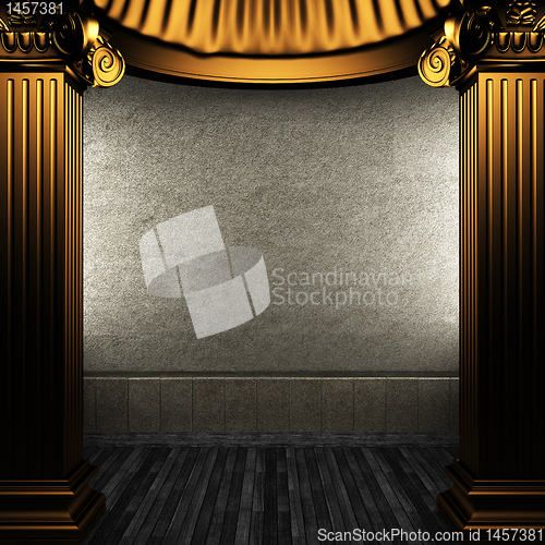 Image of bronze columns and wall