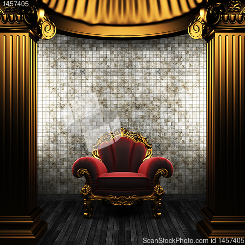 Image of bronze columns, chair and tile wall