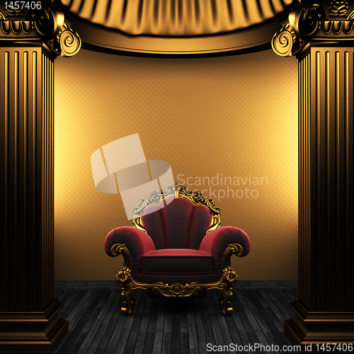 Image of bronze columns, chair and wallpaper