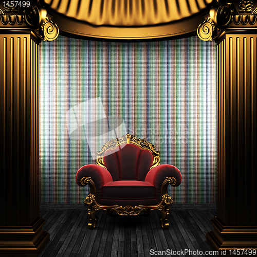 Image of bronze columns, chair and tile wall
