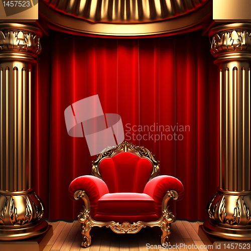 Image of red velvet curtains, gold columns and chair