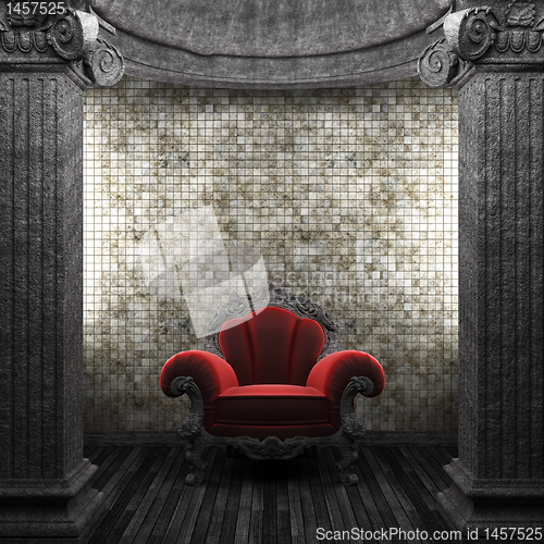 Image of stone columns, chair and tile wall