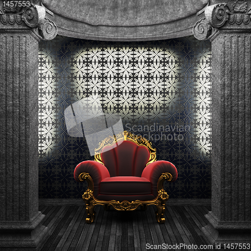 Image of stone columns, chair and tile wall